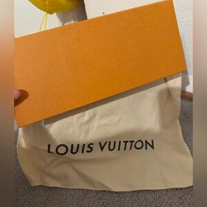 Lv box and dust bag.